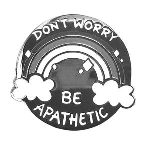 May include: A silver-coloured pin featuring a rainbow, clouds, and the text "Don't Worry Be Apathetic".
