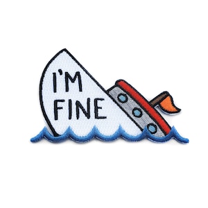 May include: Embroidered iron-on patch featuring a cartoon illustration of a sinking boat with the text "I'M FINE" on the side. The boat is red, gray, and white, and the water is blue.