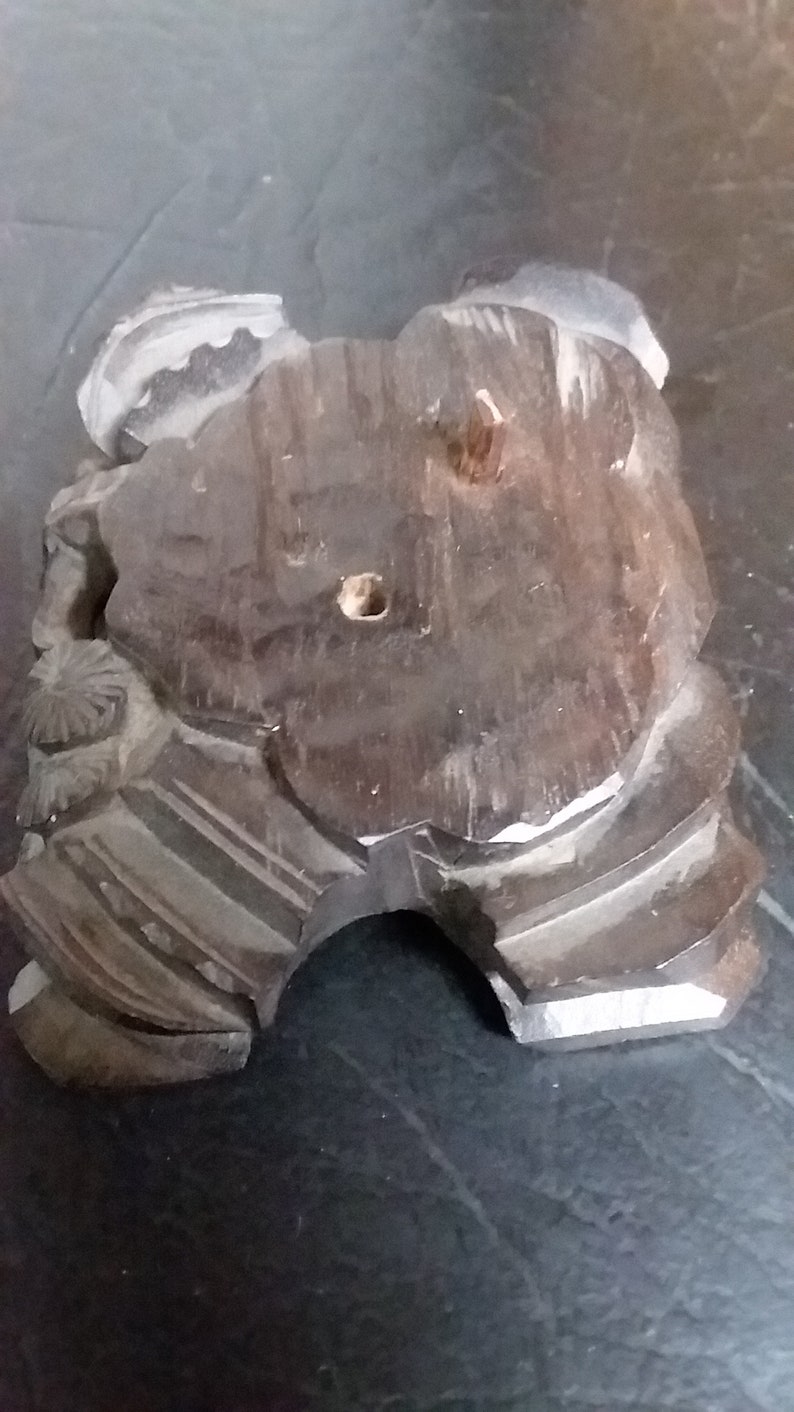 Chinese hand carved budda with ivory eyes and teeth