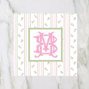May include: A pink and green monogrammed card with a floral pattern. The monogram is "MB" in a script font.