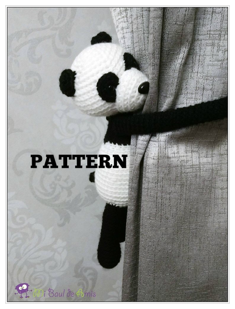 May include: A black and white crocheted panda bear curtain tieback. The panda is holding a black cord that is attached to the curtain. The text "PATTERN" is printed in black on a white background.