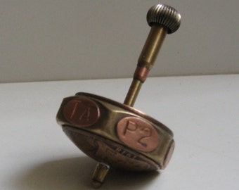 Vintage Penny, Brass & Copper Put And Take Spinning Teetotum With Secret Compartment