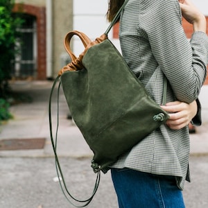 Green suede backpack top