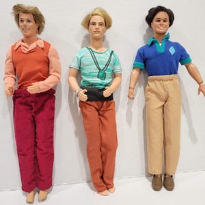 Lot of 3 Vintage Ken Barbie Dolls with Vintage Clothing