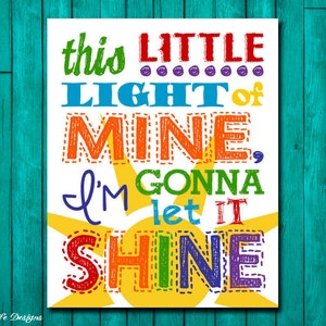 May include: A colorful print with a yellow sun and the text "this LITTLE LIGHT of MINE, I'M GONNA let IT SHINE".