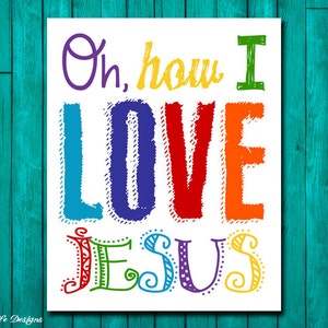 May include: A white printable sign with the text "Oh, how I LOVE JESUS" in colorful, hand-drawn lettering. The letters are outlined in black and filled with different colors, including blue, purple, red, orange, and yellow.