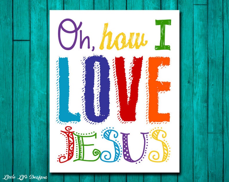May include: A white printable sign with the text "Oh, how I LOVE JESUS" in colorful, hand-drawn lettering. The letters are outlined in black and filled with different colors, including blue, purple, red, orange, and yellow.
