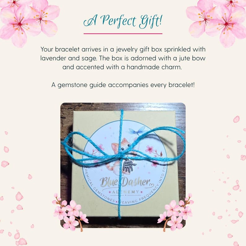 May include: A gift box tied with blue twine, featuring a circular label with a fox illustration and the text "Blue Dasher Alchemy." The box is adorned with a handmade charm and the text "A Perfect Gift!"