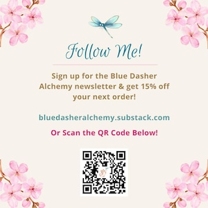 May include: A promotional graphic with the text "Follow Me!" and "Sign up for the Blue Dasher Alchemy newsletter & get 15% off your next order!" A QR code is included, along with the website address bluedasheralchemy.substack.com. Pink floral accents.