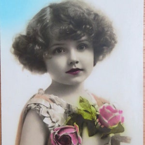 1910s Hand Tinted Photo Postcard: Little Girl with Roses by Noyer