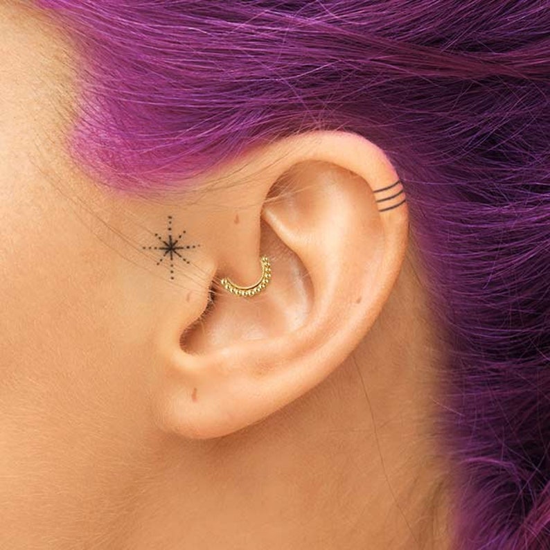 gold daith piercing