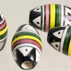 Peruvian Hand Painted Design ceramic beads. X 10 OVAL Shape . Ideal for Hair,Jewellery & all crafts  V054