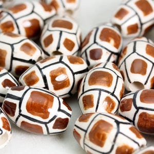 Peruvian ceramic hair and jewellery beads  X 10 Beads Hand Painted. V039