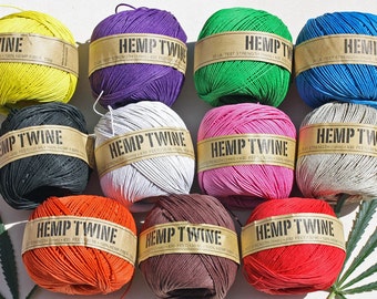 May include: Ten spools of hemp twine in various colors, including yellow, purple, green, blue, black, white, pink, gray, orange, and brown. Each spool has a label that reads "Hemp Twine" and includes the text "430 feet (130 m) - 100% Hemp Fiber".