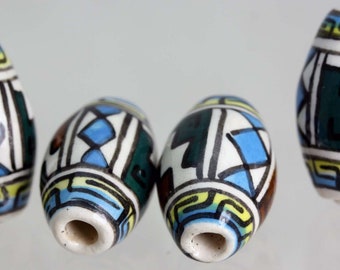 Perles péruviennes géométriques peintes à la main. Lot de 10, forme OVALE... V077