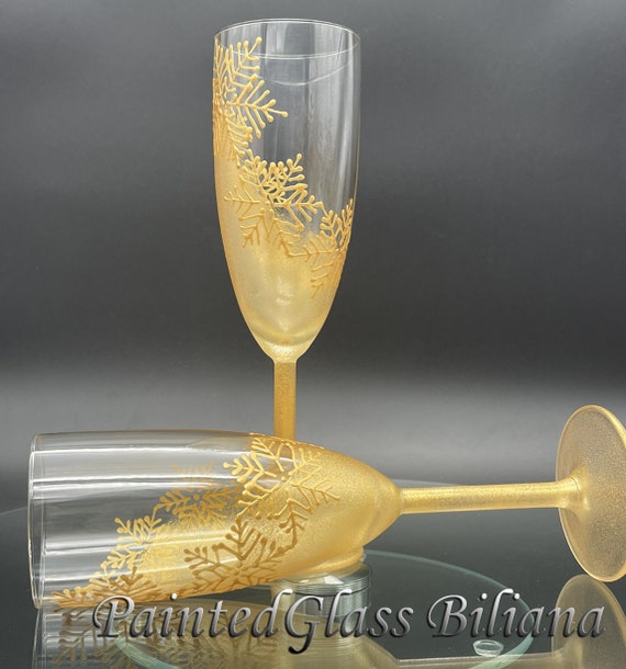 Set of 2 Winter Wedding toasting hand painted champagne flutes Golden snowflakes