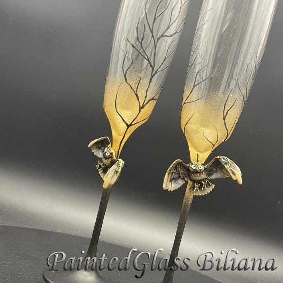 Black gold owl toasting wedding flutes
