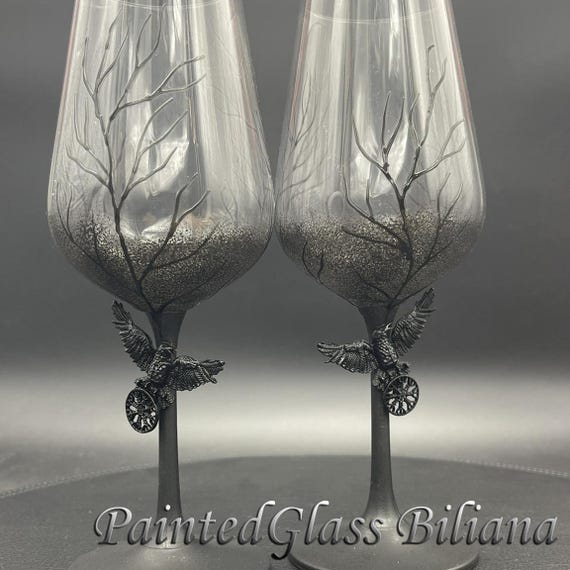 Black raven crow toasting wine glasses
