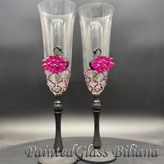 Hot pink black swan wedding champagne flutes
