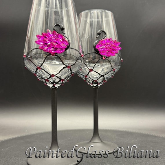 Hot pink black swan wine glasses