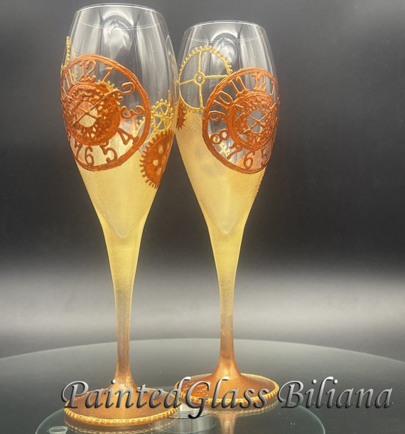 Steampunk gears toasting glasses in gold and copper color, set of 2