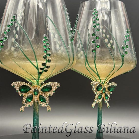 Green butterfly pained wine glasses