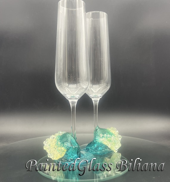 Ocean waves wedding toasting flutes