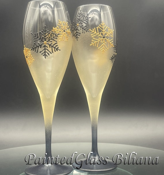 Set of 2 Winter Wedding toasting hand painted champagne flutes Snowflakes in gold and black color