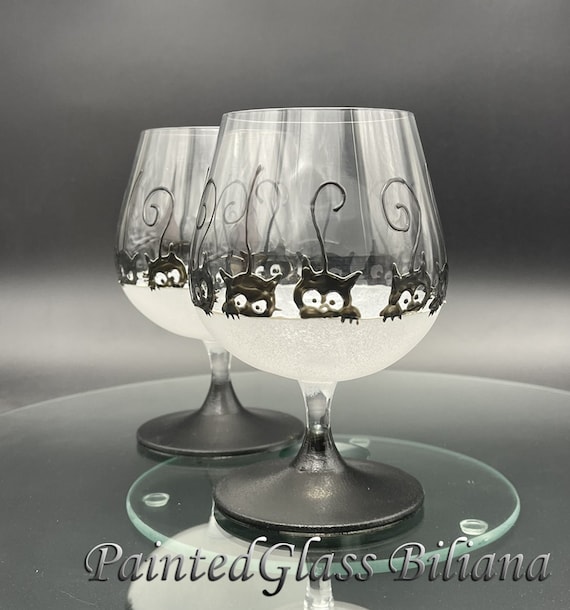 Black cats brandy whiskey glasses