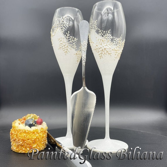 Set of 2 Winter Wedding toasting hand painted champagne flutes White snowflakes Cake server and knife