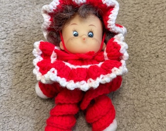 Hand made vintage doll with crocheted red and white outfit