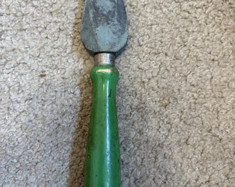 Vintage knife sharpener, green handle