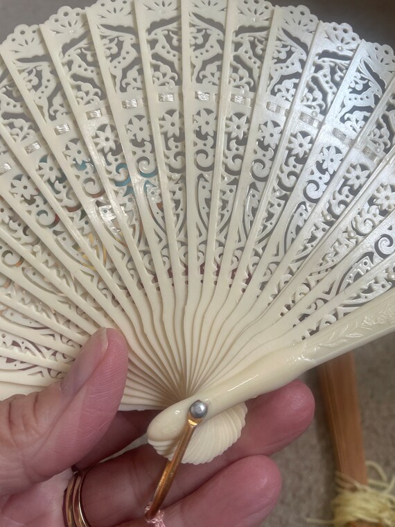 Group of three hand held fans Gem