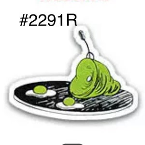 May include: A sticker featuring a whimsical illustration of green eggs and ham on a black plate. The green ham is a large, rounded shape with a string attached. The plate also has two fried eggs and a green yolk. The sticker has the text "#2291R".