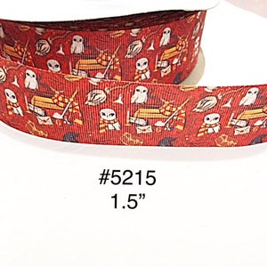 May include: Red ribbon with a repeating pattern of owls, books, and other themed graphics. The ribbon is 1.5 inches wide. The text "#5215" is printed on the ribbon.