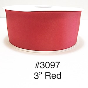 May include: A spool of red ribbon, 3 inches wide, with a textured surface. The ribbon is a solid, vibrant red color. The text "#3097" and "3" Red" is printed on the image.