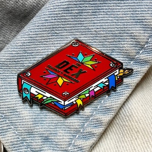 El pin de esmalte DEX · Manual del entrenador · Pin de solapa con estilo brillante