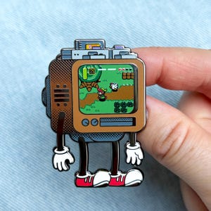 Hyahh! Buddy - Pot-Smashing Warrior - Retro Video Game Console - Deluxe Hard Enamel Pin with UV Print - Shiny Flair Lapel Pin