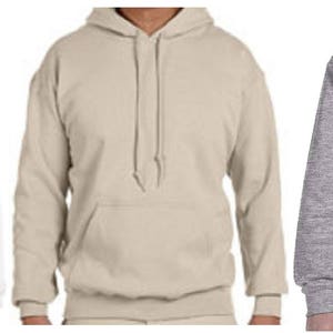 May include: Three different sweatshirts: a white crew neck sweatshirt, a beige hooded sweatshirt, and a gray zippered hooded sweatshirt.