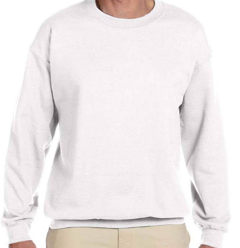 May include: A white crew neck sweatshirt with long sleeves.