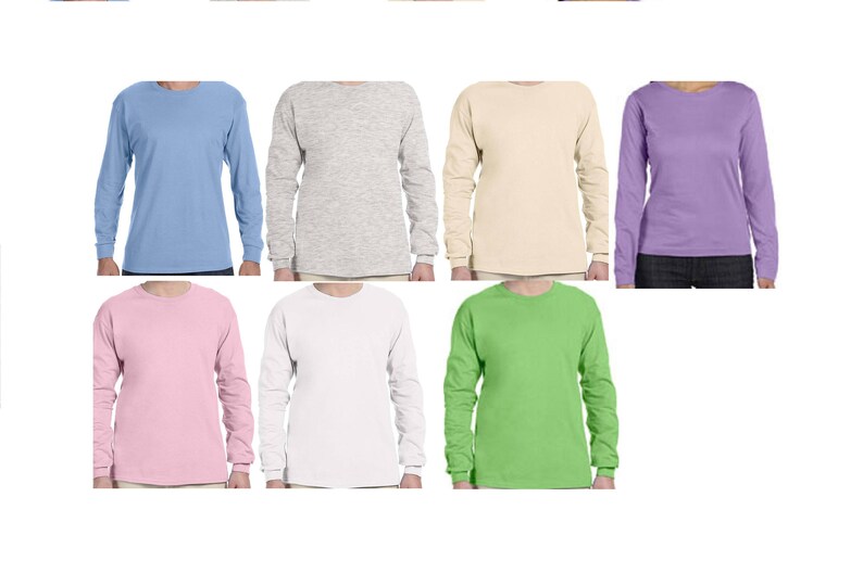 May include: Eight long-sleeved t-shirts in different colors: light blue, grey, beige, purple, pink, white, green, and black.