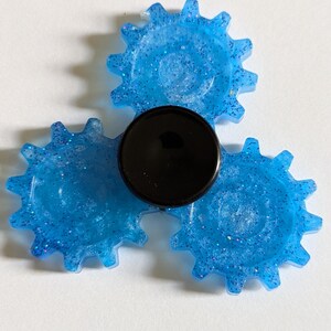 Glänzende blaue Zahnräder
