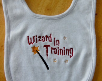 HP themed 'wiz'  machine embroidered bib.