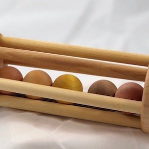 Rolling Ball Cylinder - Essential Montessori