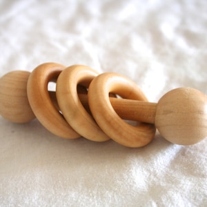 Essential Montessori Classic Wooden Ring Shaker