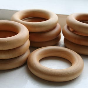 25 Wooden Rings Essential Montessori image 1