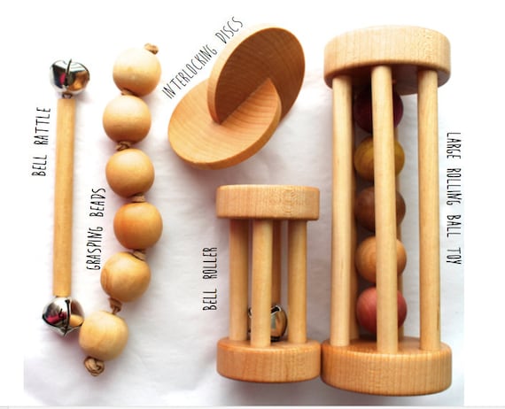 Colored Discs on Three Dowels – Pink Montessori