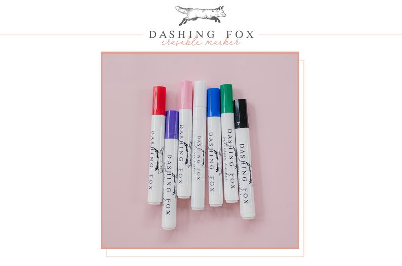four different colored pens sitting next to each other