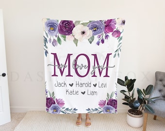 May include: Purple and white floral blanket with the text "MOM we love you" and the names Jack, Harold, Levi, Katie, and Liam.