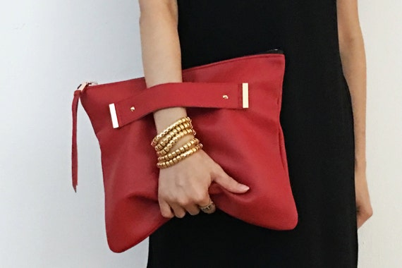 leather clutch with strap